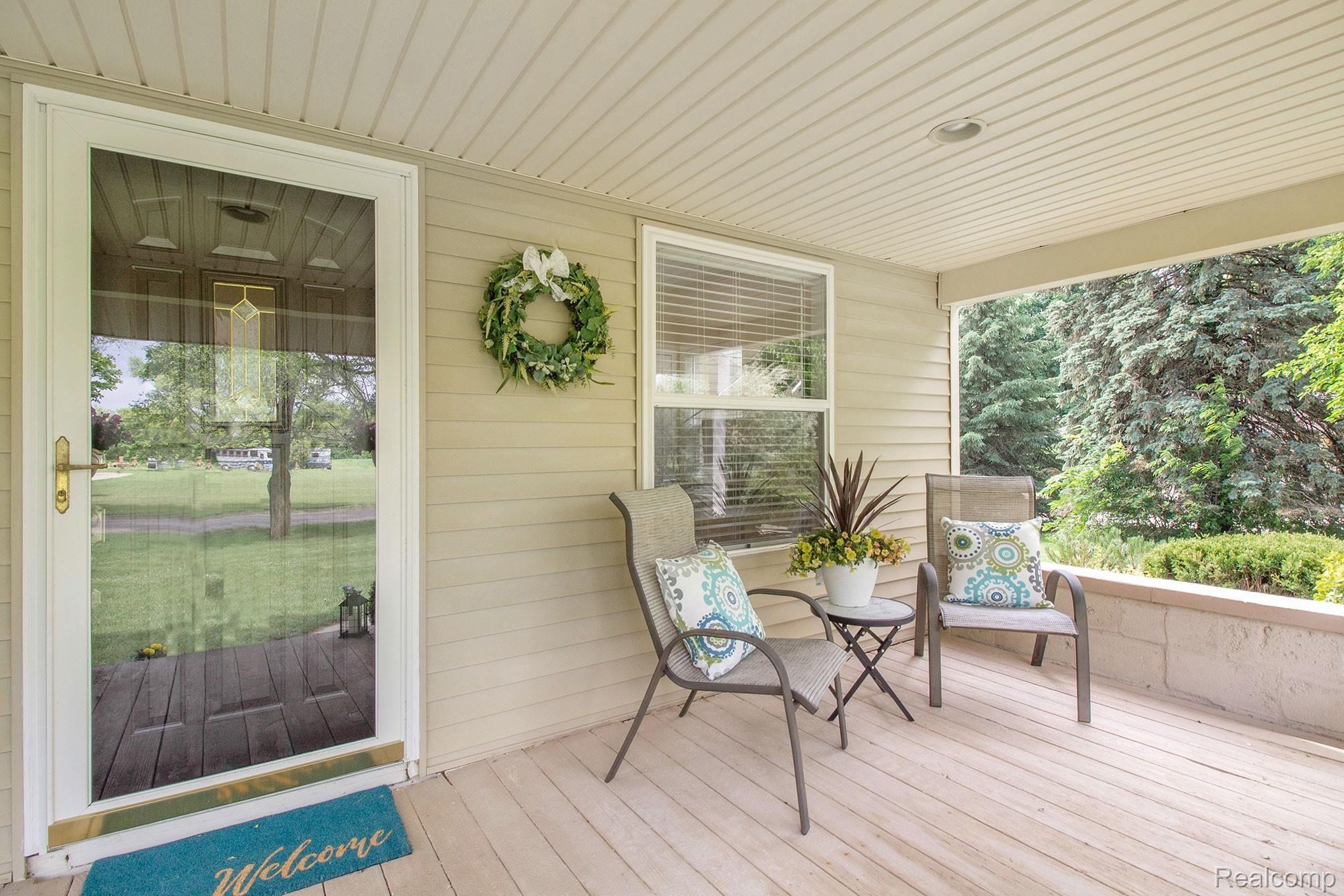 3950 Cemetery Road Fowlerville, MI 48836 - Photo 2 of 24 Beautiful Front Porch to Relax and Visit with Family and Friends!