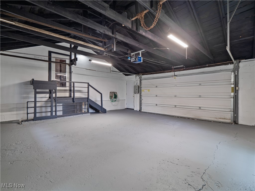 3605 Center Road Avon, OH 44011 - Photo 22 of 34 2 car oversized garage featuring a garage door opener