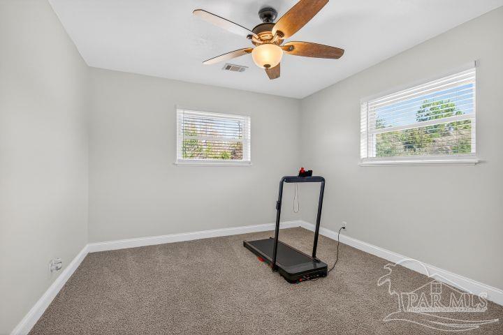 8940 Indian Ford Road Milton, FL 32570 - Photo 53 of 54 a view of a room with gym equipment