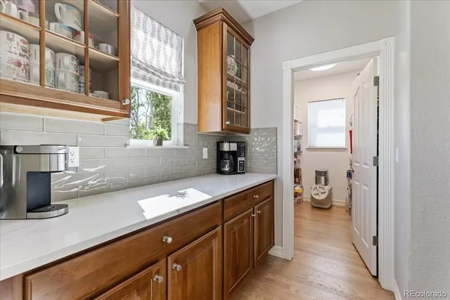 a kitchen with a sink and a window