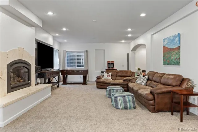 a large kitchen with a table and chairs