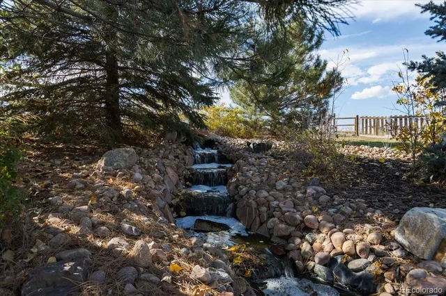 a view of a chairs and table in the patio