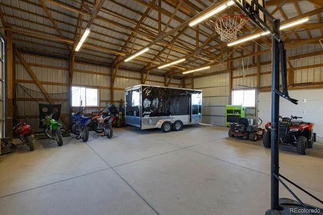 a view of a garage with sitting area