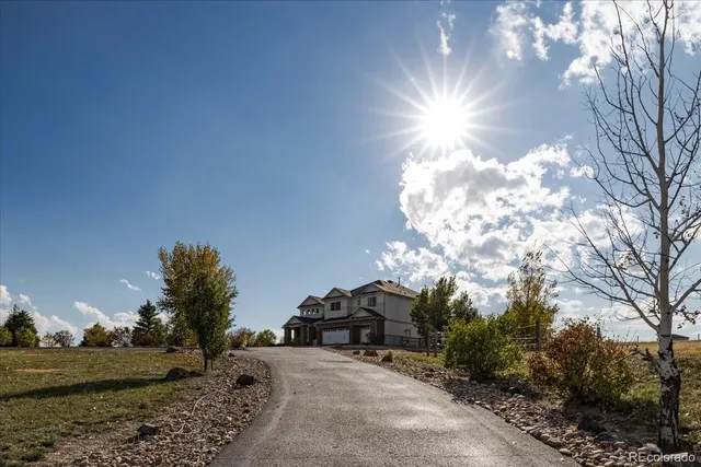 an aerial view of a house with garden
