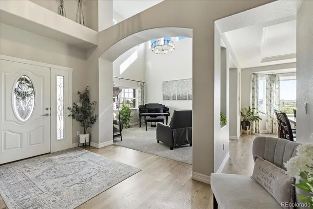 a view of a livingroom with furniture and windows