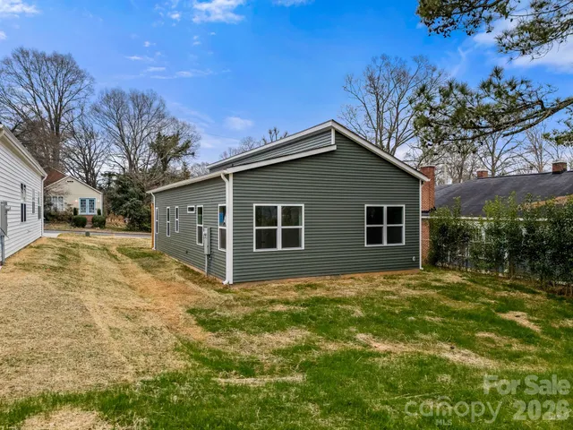 a view of backyard with green space