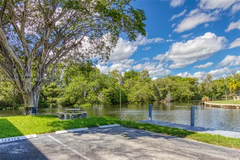 a view of a lake with a yard