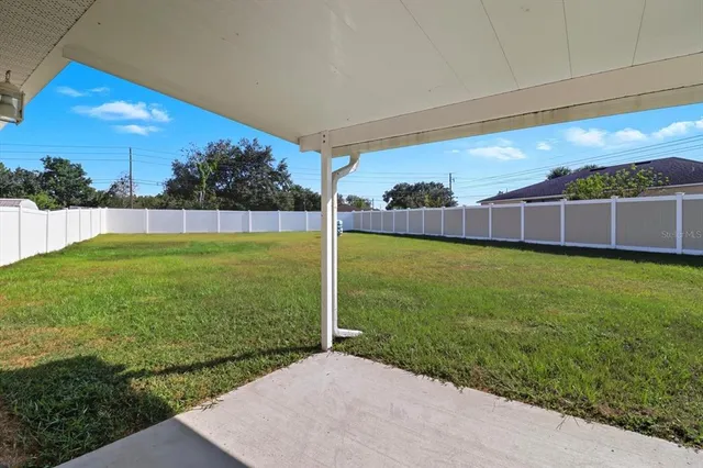 a view of a building with a door and a window