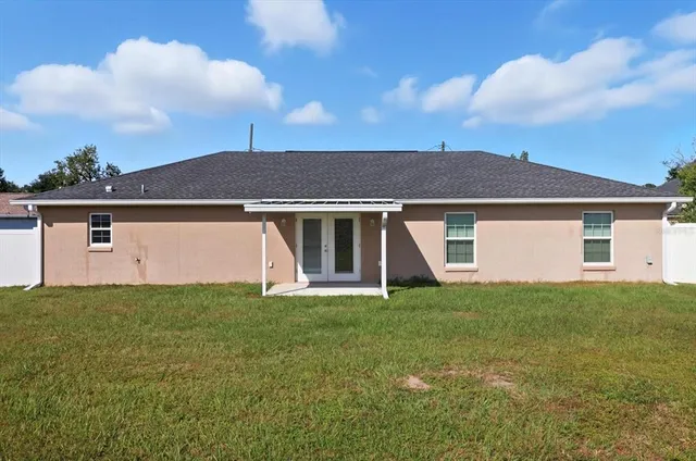 a view of a house with a big yard