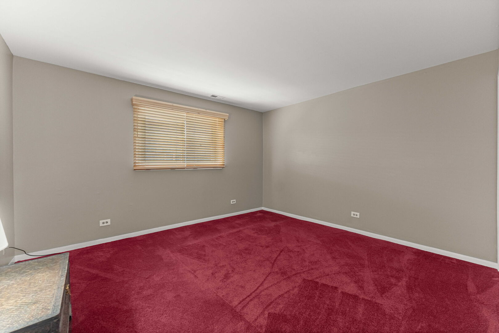 9122 South Pulaski Road, Unit 2E Oak Lawn, IL 60453 - Photo 13 of 16 an empty room with a window