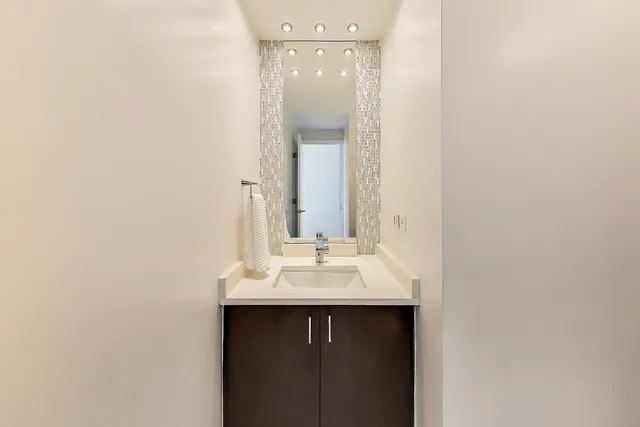 a bedroom with a bed and a television in it