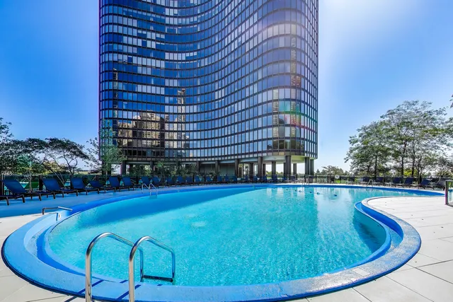 a view of a yard with large trees