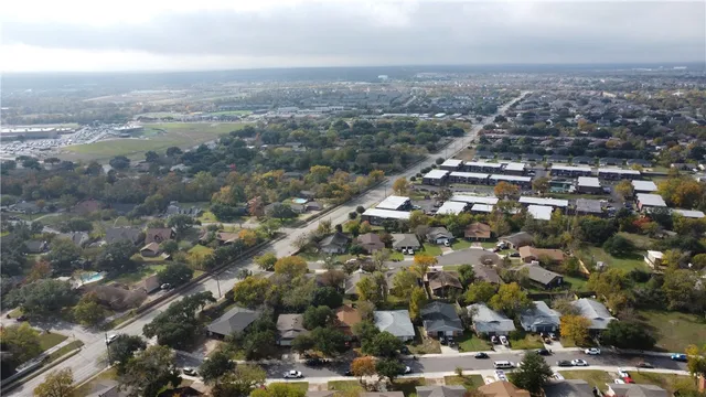 an aerial view of a city with lots of residential buildings
