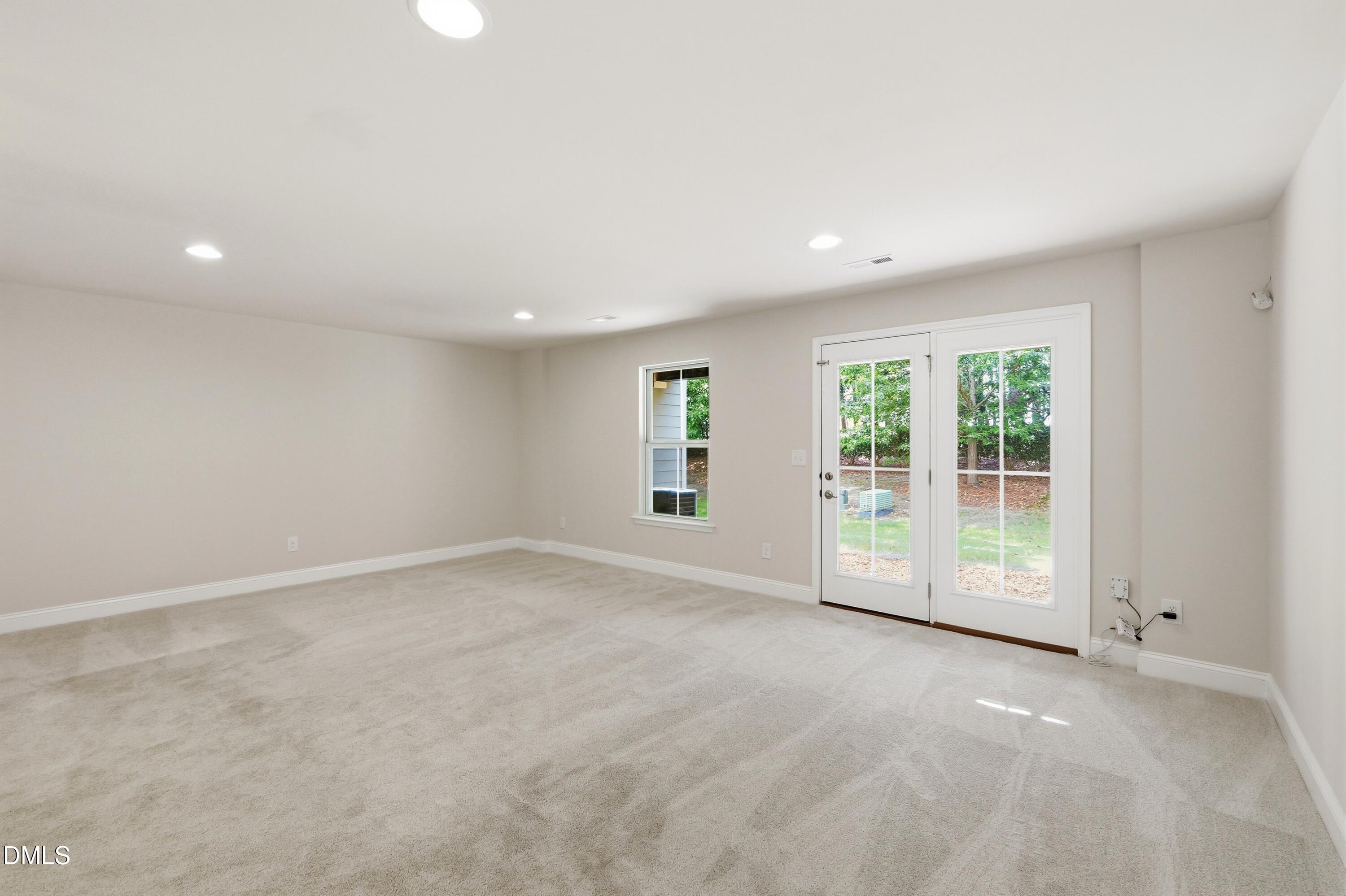 1004 Waymaker Court Apex, NC 27502 - Photo 26 of 30 a view of an empty room with a window