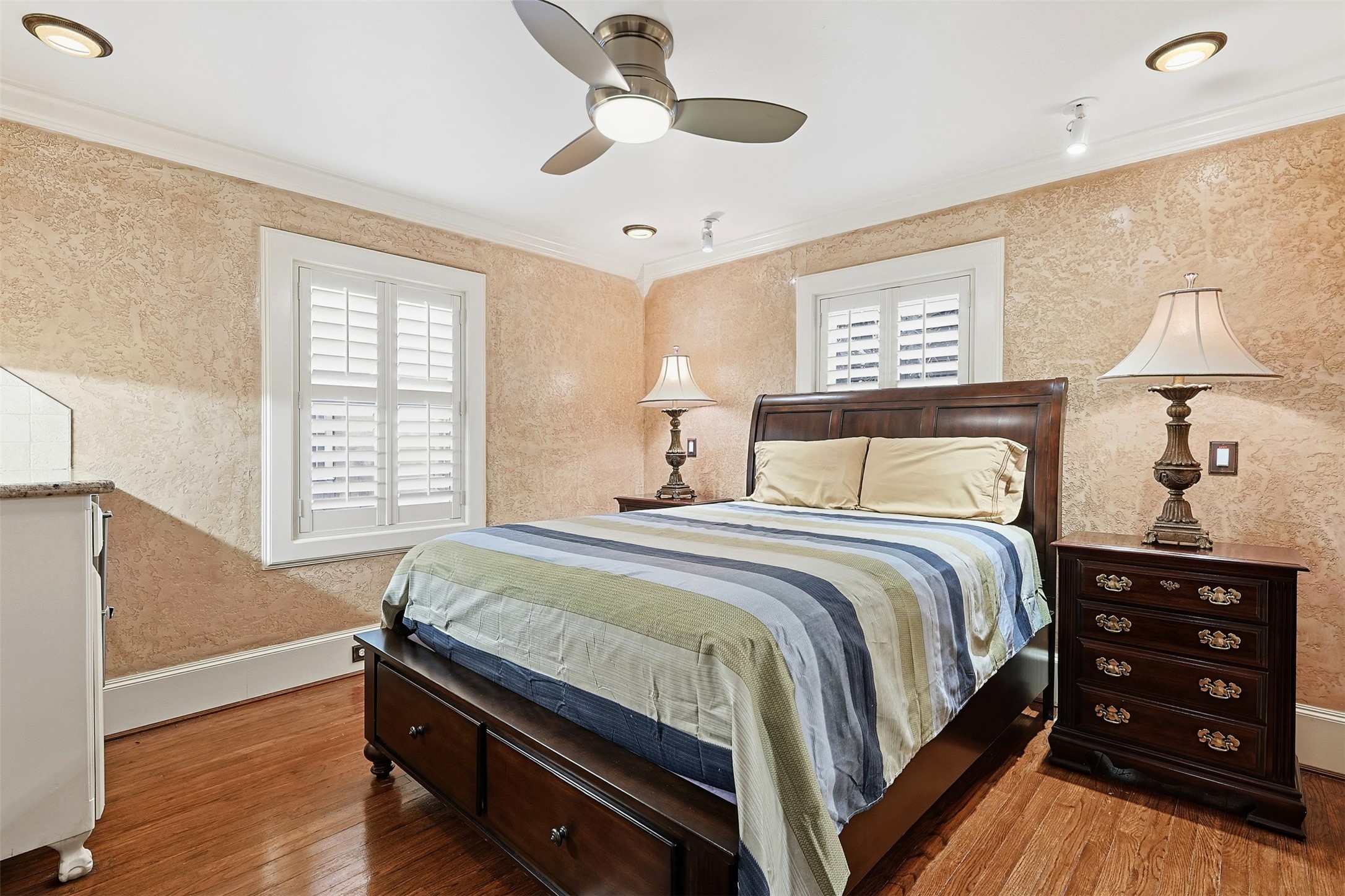 3543 Rosedale Street Houston, TX 77004 - Photo 17 of 37 a bedroom with a bed and a window