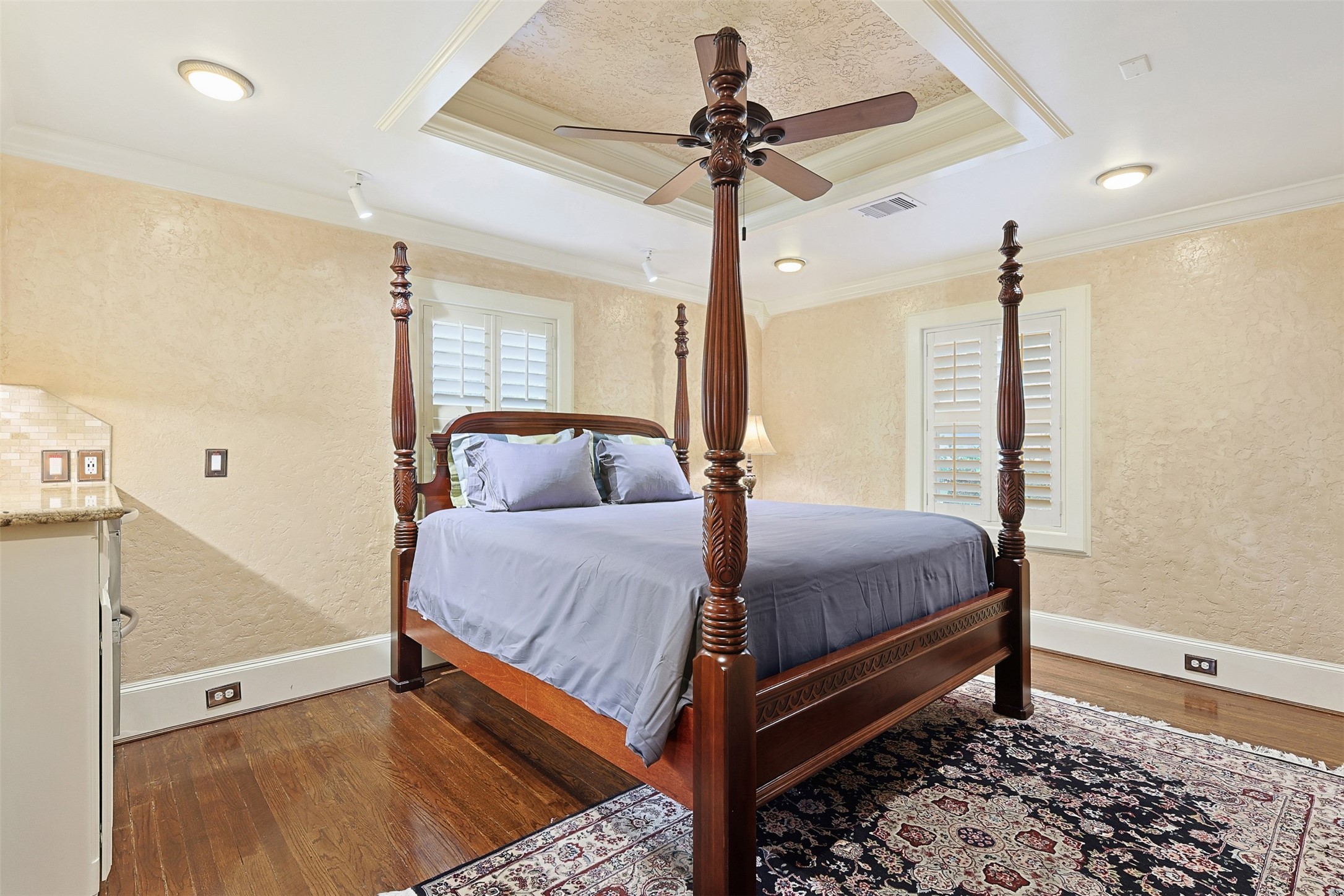3543 Rosedale Street Houston, TX 77004 - Photo 24 of 37 a bedroom with a bed chandelier and a window