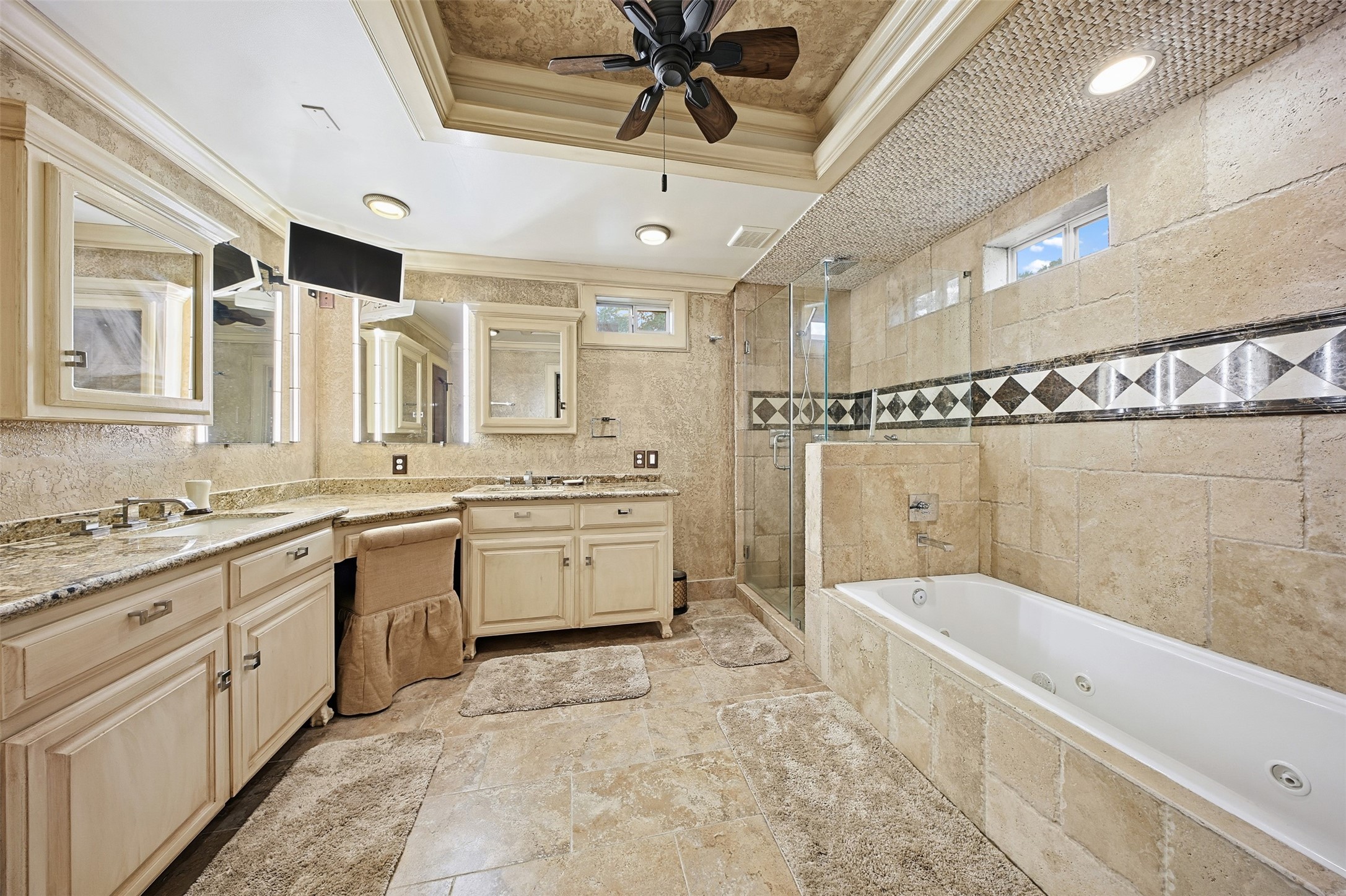 3543 Rosedale Street Houston, TX 77004 - Photo 26 of 37 a bathroom with a granite countertop sink a mirror a bathtub and shower