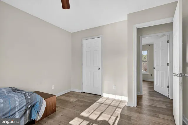a living room with furniture and flat screen tv