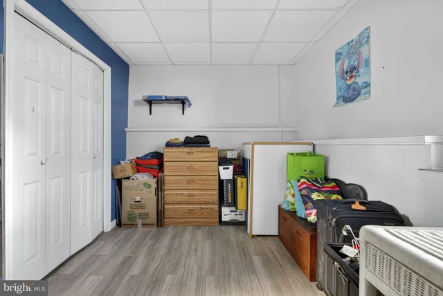 a view of a swimming pool with a yard