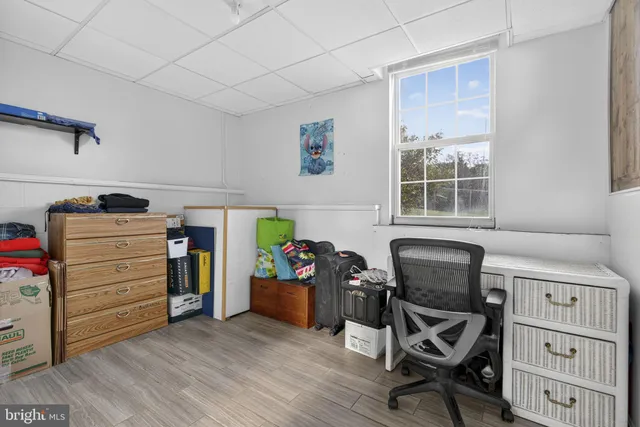 an aerial view of a residential houses with outdoor space