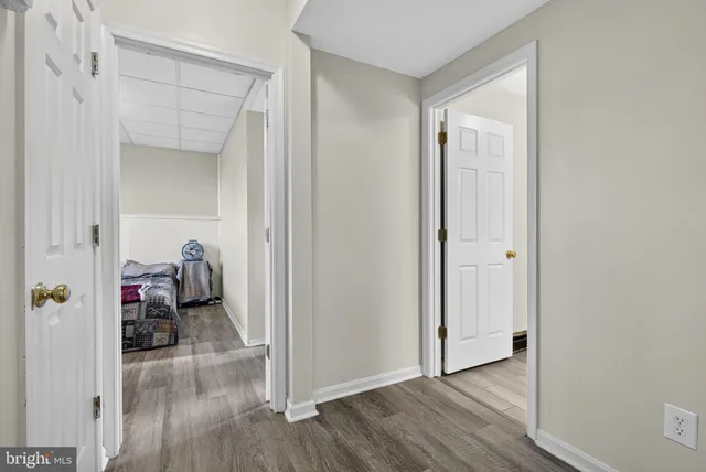 a view of backyard with swimming pool