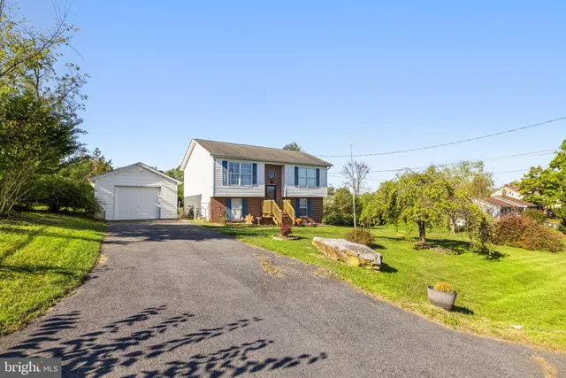 a view of a chairs and table in the outdoor