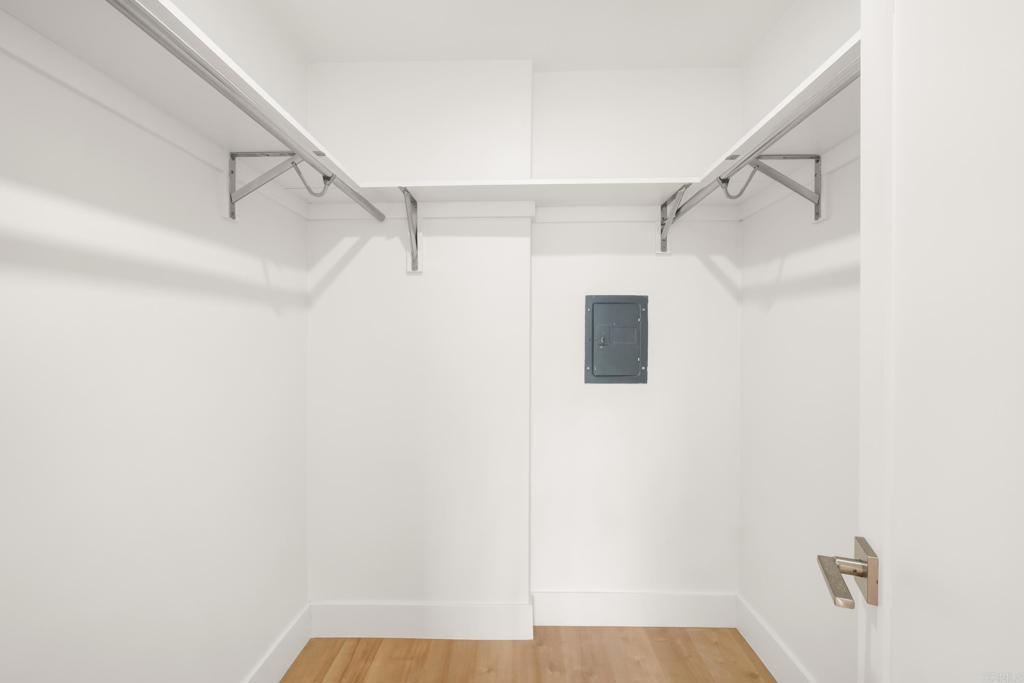 4444 West Point Loma Boulevard, Unit 122 San Diego, CA 92107 - Photo 18 of 25 a view of walk in closet with empty racks