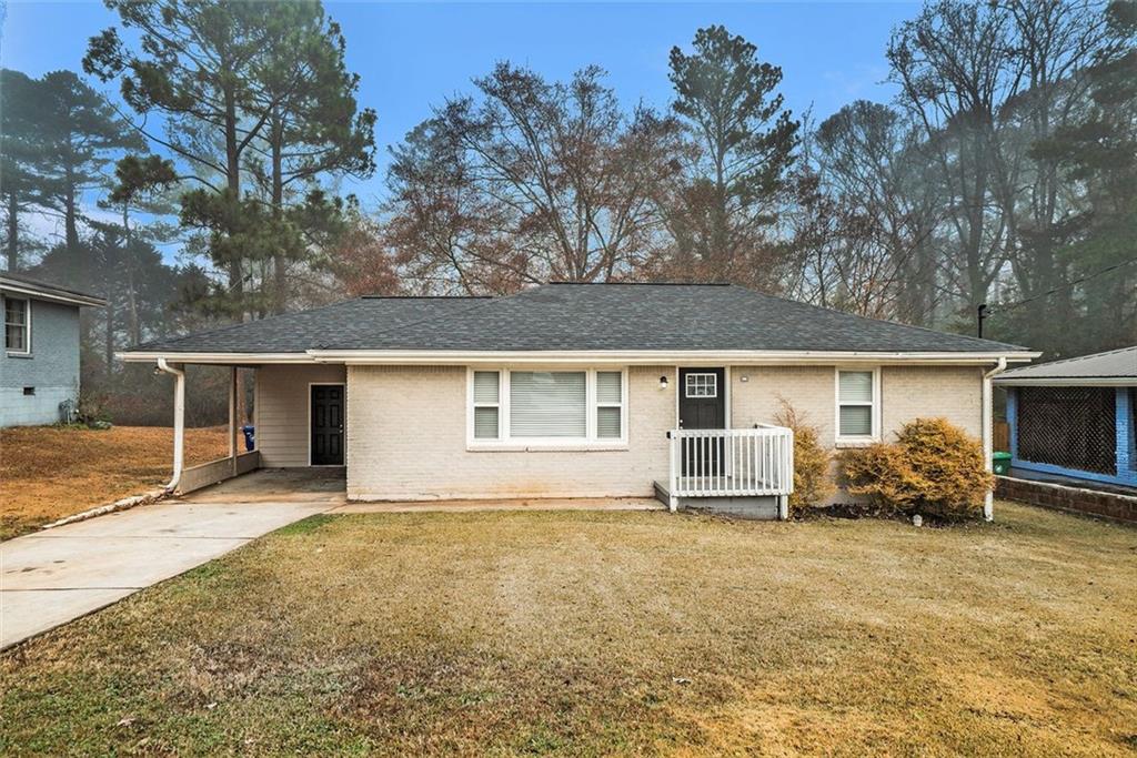 3152 Robin Road Decatur, GA 30032 - Photo 1 of 1 front view of a house with a patio