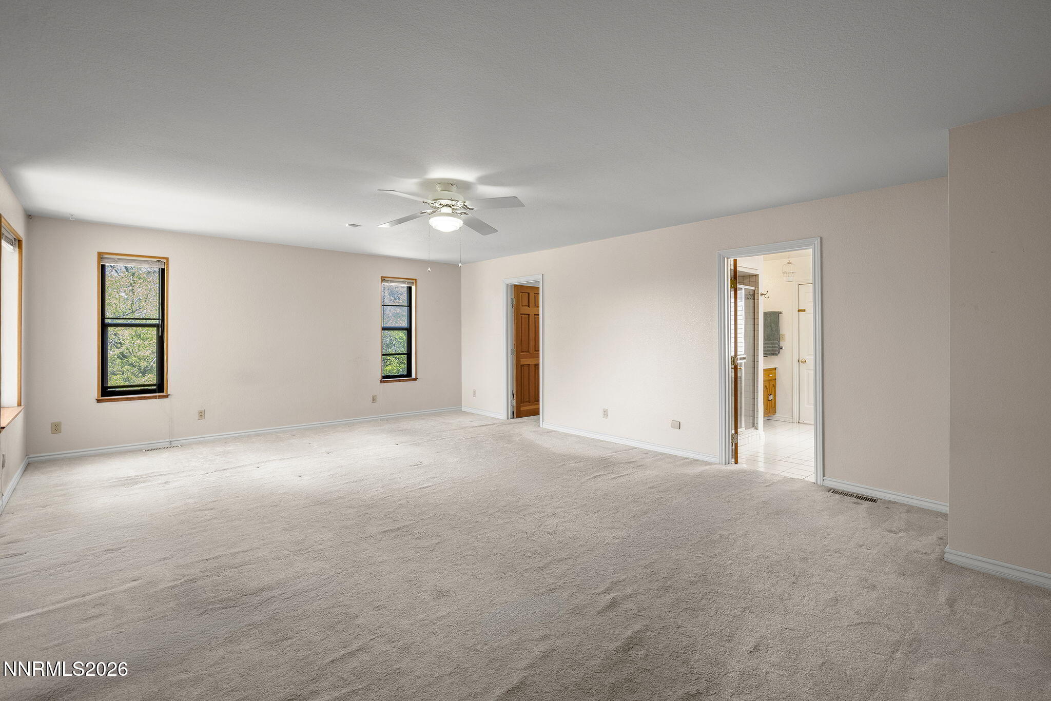 2985 Socrates Drive Reno, NV 89512 - Photo 15 of 52 a view of empty room with windows