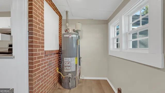 a view of balcony with wooden floor and windows