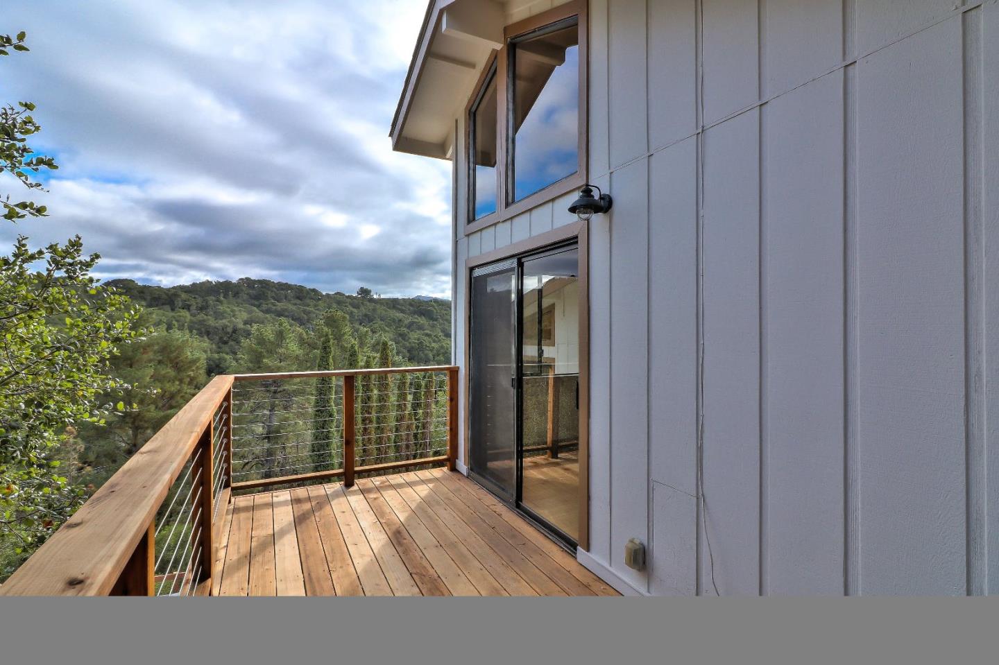 11551 Hidden Valley Road Carmel Valley, CA 93924 - Photo 32 of 33 a view of balcony with two flat screen tv