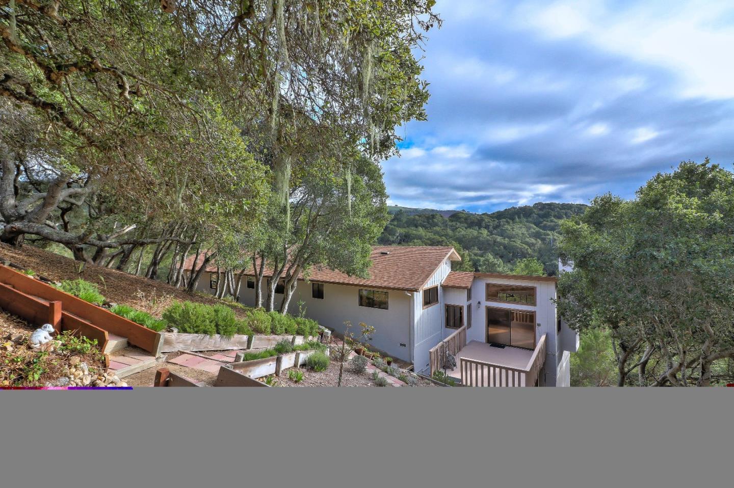 11551 Hidden Valley Road Carmel Valley, CA 93924 - Photo 33 of 33 a view of a house with a street