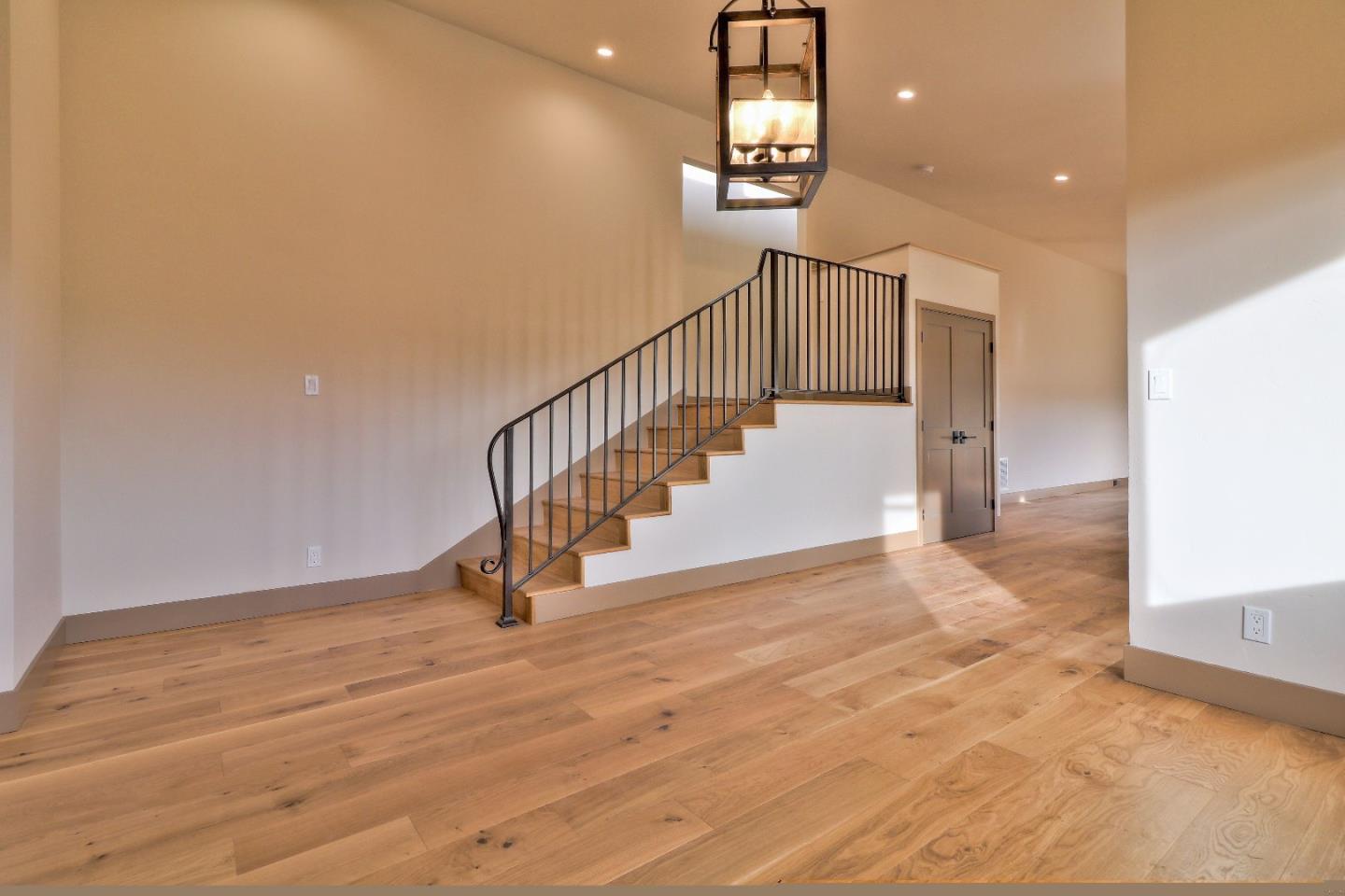 11551 Hidden Valley Road Carmel Valley, CA 93924 - Photo 9 of 33 a view of entryway and hall with wooden floor