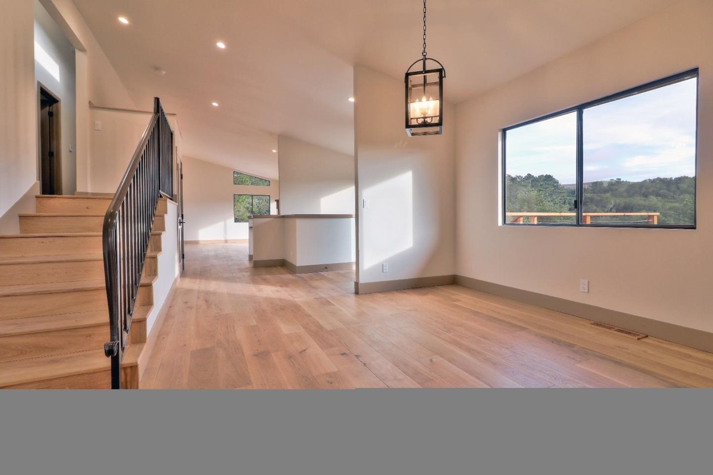 11551 Hidden Valley Road Carmel Valley, CA 93924 - Photo 10 of 33 a view of an empty room with a window