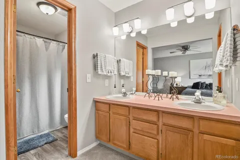 a bathroom with a sink double vanity and a mirror