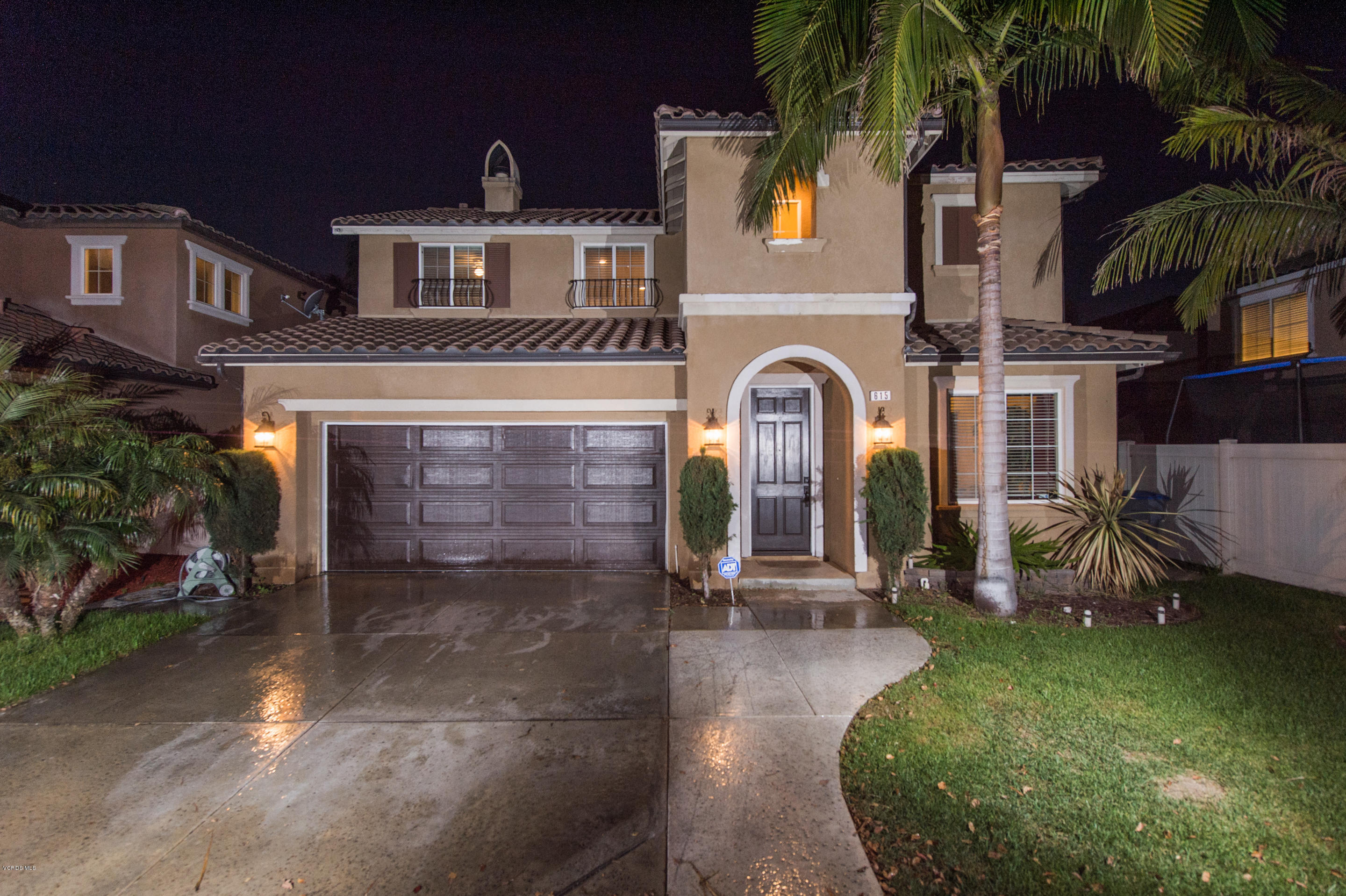 615 Halifax Lane Oxnard, CA 93035 - Photo 1 of 12 a front view of a house with a yard