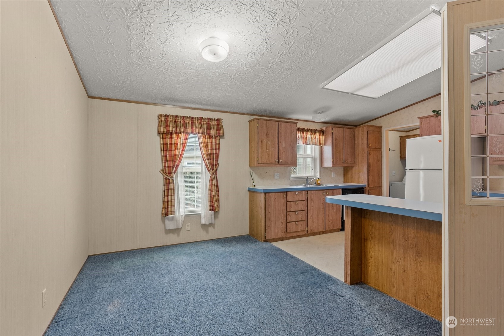 1529 Bishop Road, Unit F Chehalis, WA 98532 - Photo 11 of 21 a view of a kitchen with a sink and cabinets
