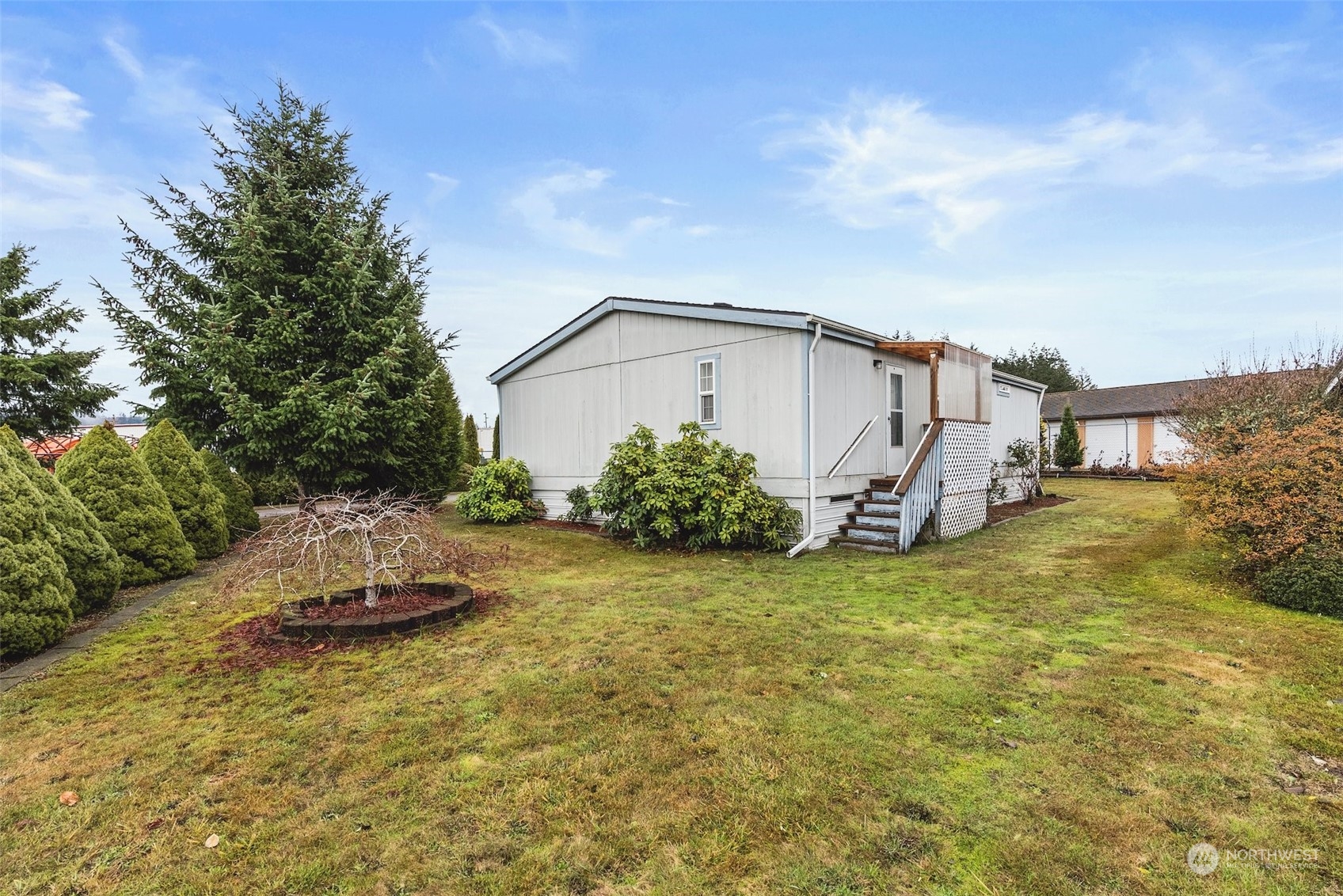 1529 Bishop Road, Unit F Chehalis, WA 98532 - Photo 2 of 21 a view of a house with a yard