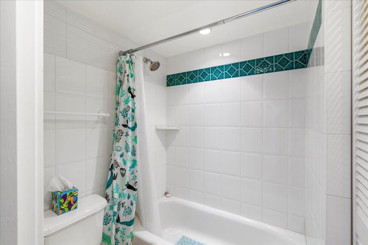 3601 Lower Honoapiilani Road, Unit 201 Lahaina, HI 96761 - Photo 12 of 37 a bathroom with a tub and shower