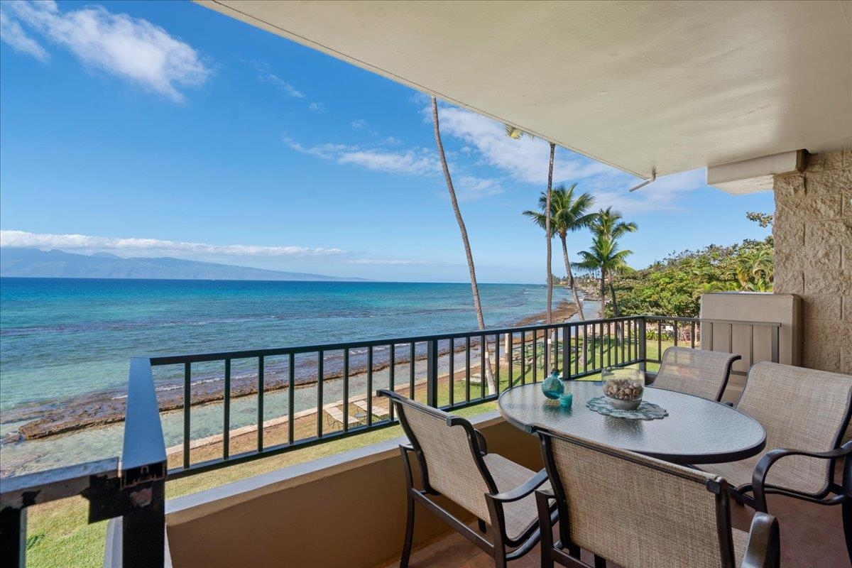 3601 Lower Honoapiilani Road, Unit 201 Lahaina, HI 96761 - Photo 13 of 37 a view of a chairs and table on the balcony