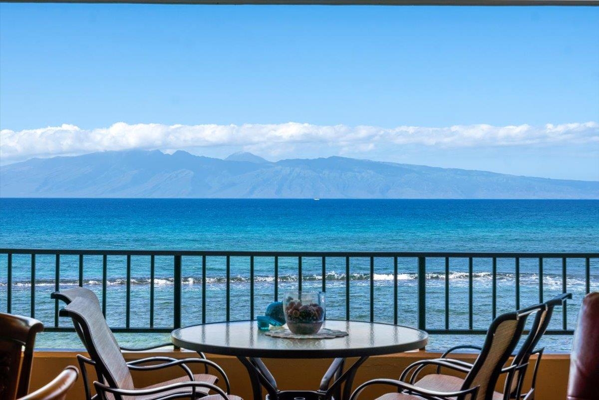 3601 Lower Honoapiilani Road, Unit 201 Lahaina, HI 96761 - Photo 2 of 37 a view of a city from a balcony