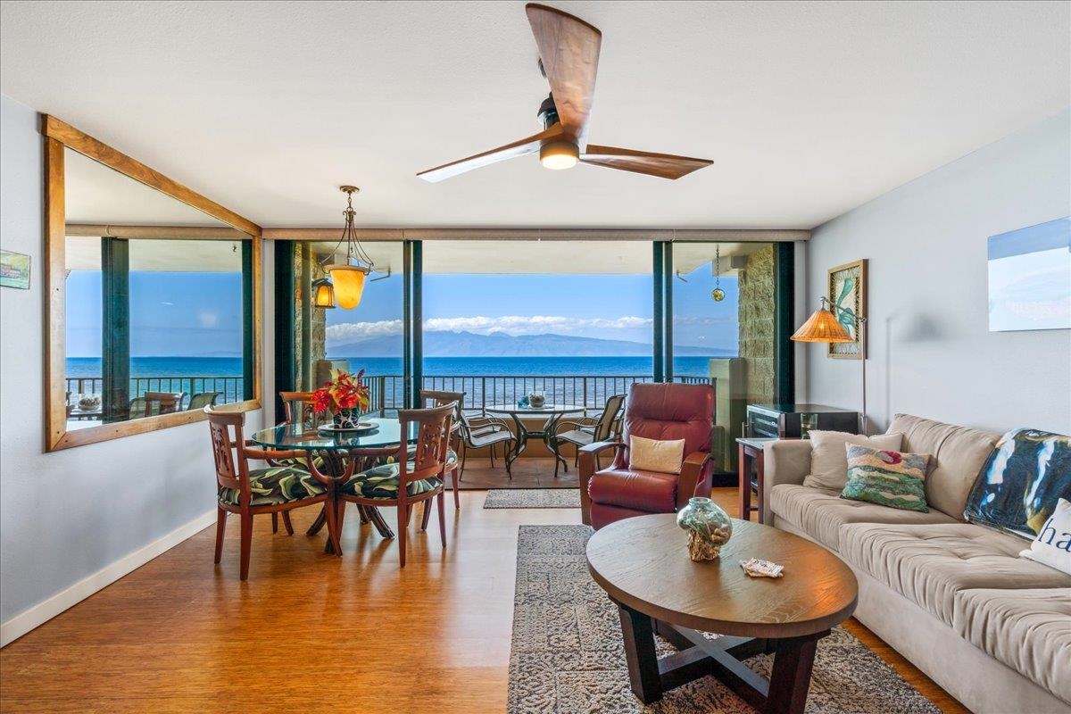 3601 Lower Honoapiilani Road, Unit 201 Lahaina, HI 96761 - Photo 24 of 37 a living room with furniture and a large window