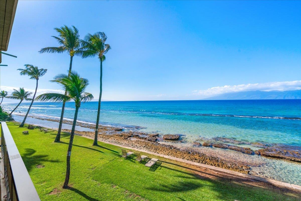 3601 Lower Honoapiilani Road, Unit 201 Lahaina, HI 96761 - Photo 36 of 37 a view of a swimming pool with a garden