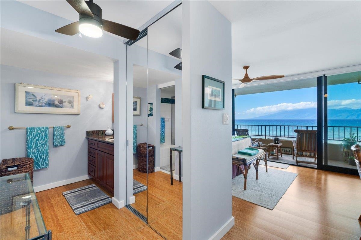 3601 Lower Honoapiilani Road, Unit 201 Lahaina, HI 96761 - Photo 9 of 37 a living room with furniture and a view of kitchen