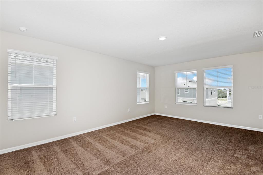 4385 Prairie Run Haines City, FL 33844 - Photo 17 of 25 a view of an empty room with a window