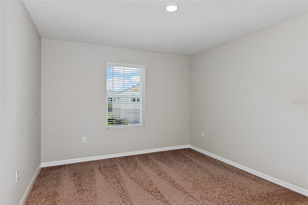 4385 Prairie Run Haines City, FL 33844 - Photo 21 of 25 an empty room with a window