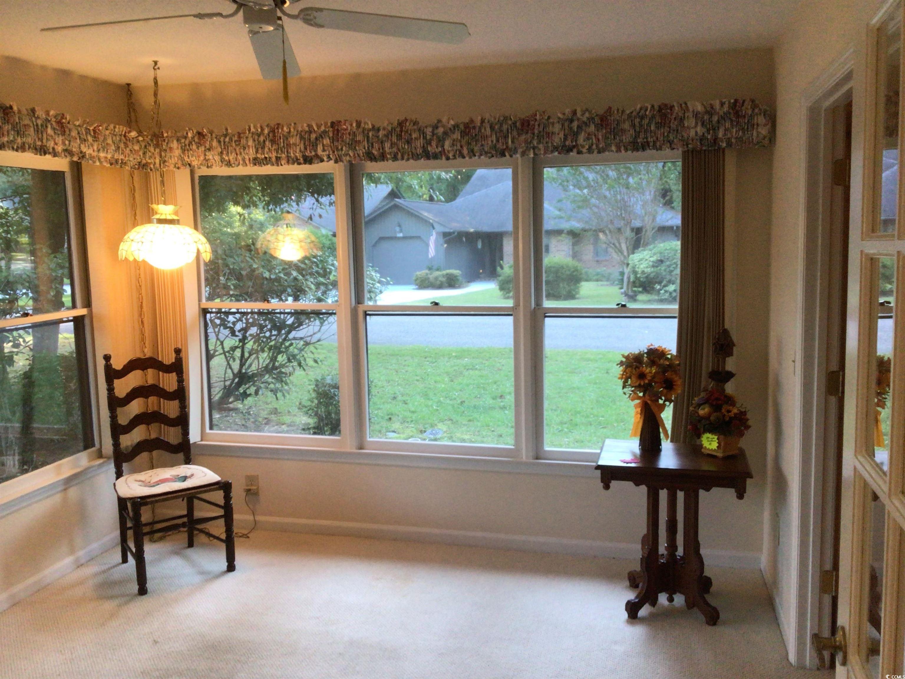 107 Myrtle Trace Drive Conway, SC 29526 - Photo 18 of 31 Living area featuring carpet floors and ceiling fan