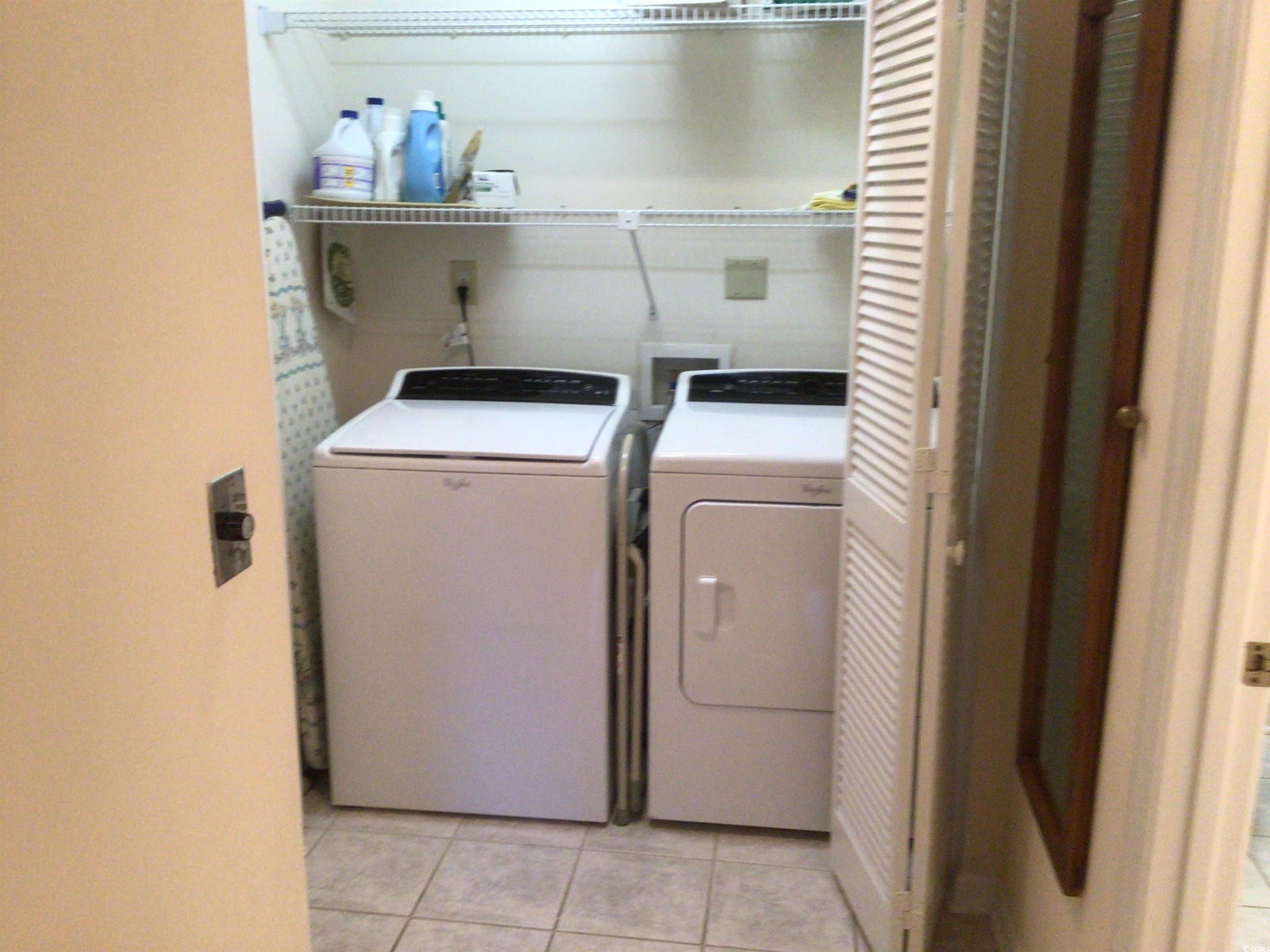 107 Myrtle Trace Drive Conway, SC 29526 - Photo 23 of 31 Laundry room with light tile patterned floors and independent washer and dryer