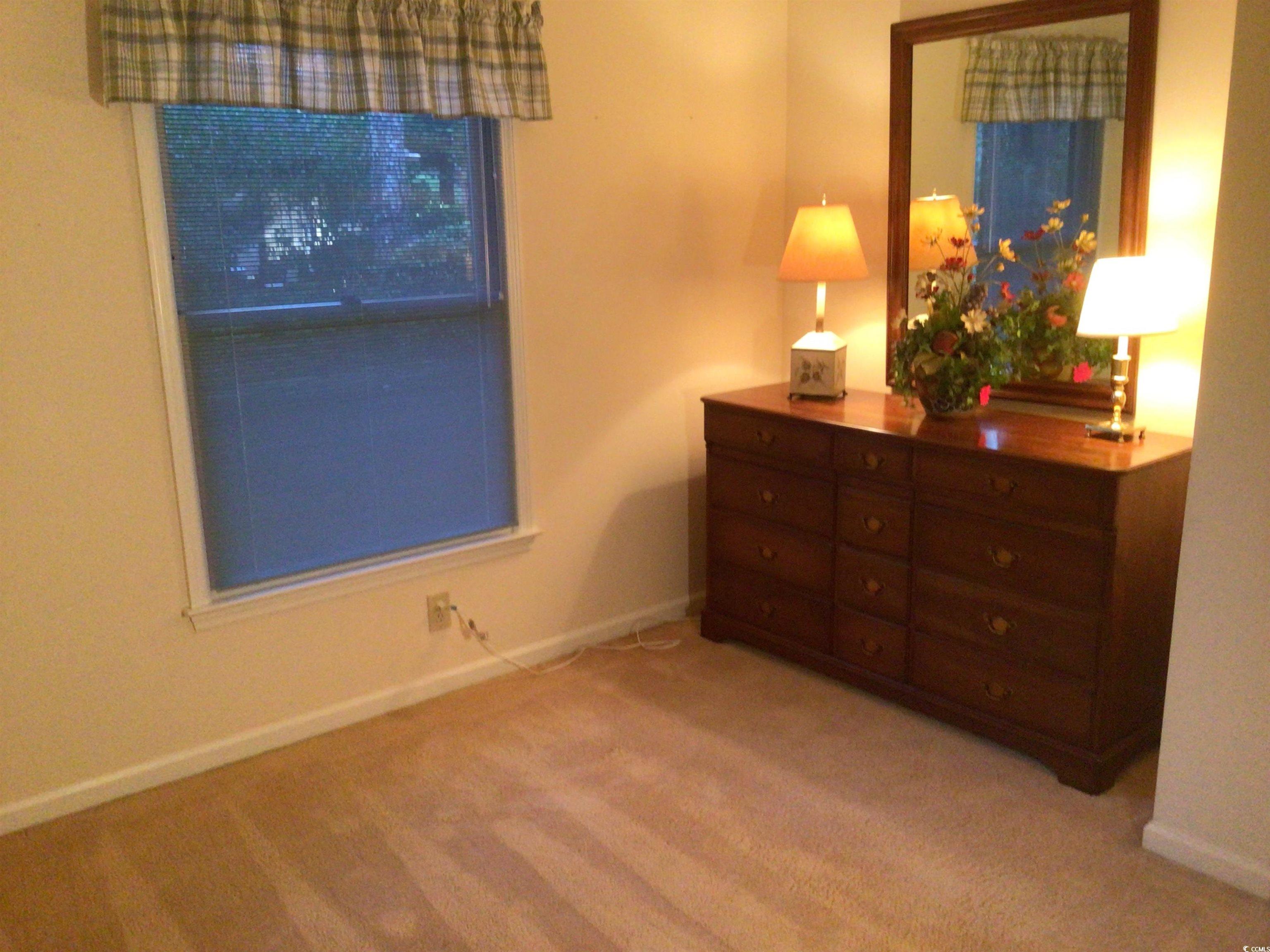 107 Myrtle Trace Drive Conway, SC 29526 - Photo 24 of 31 Bedroom featuring baseboards and light colored carpet
