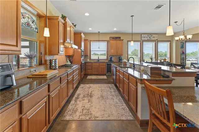 a large open kitchen with lots of counter space